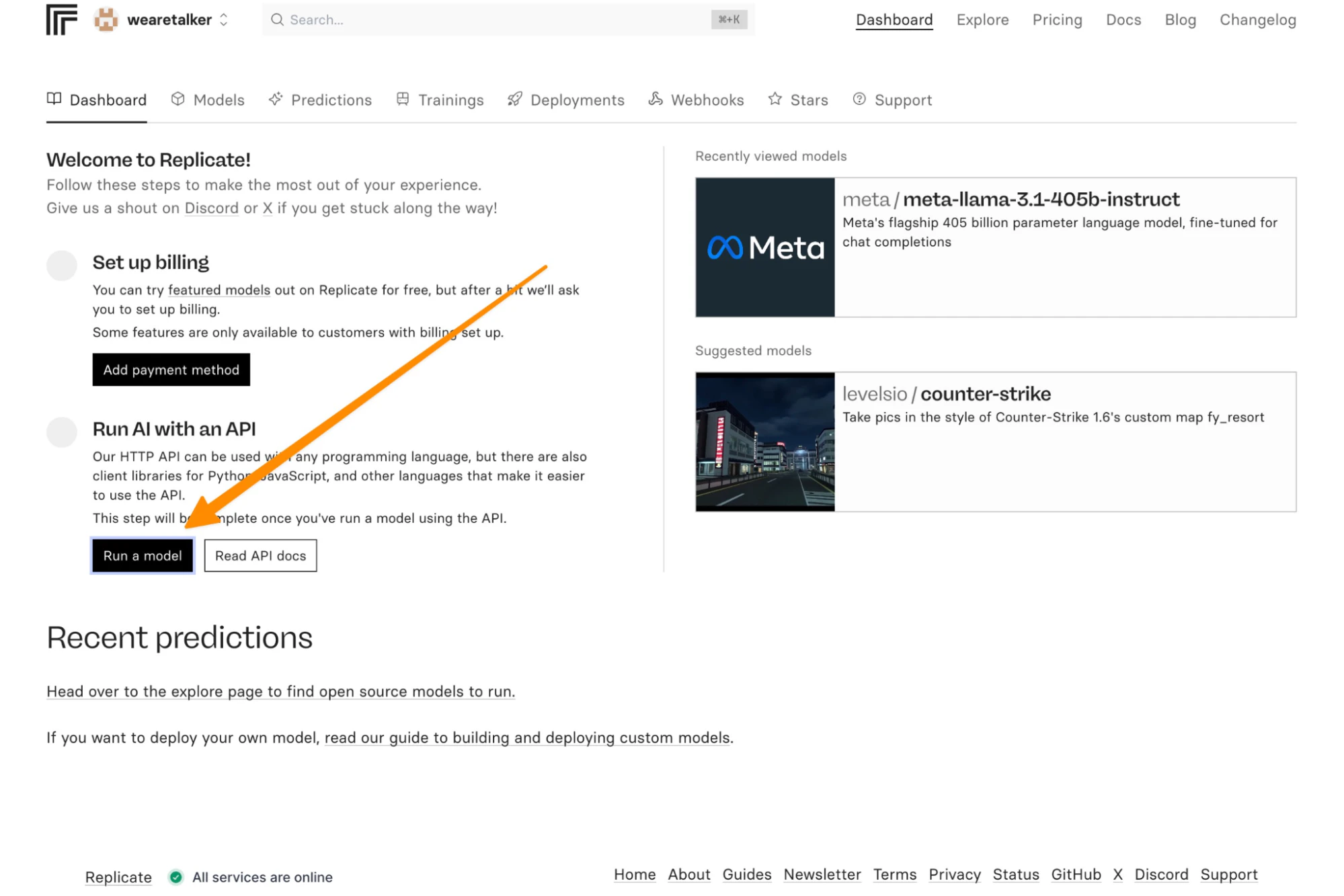 A dashboard view of the Replicate platform, showing a welcome message, options to set up billing, run AI models using an API, and recent predictions. There is an orange arrow pointing to the "Run a model" button.