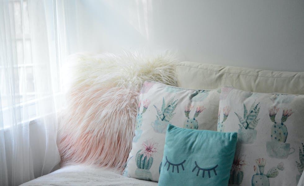 How to Keep Throw Pillows Fluffy- Even if You Have Kids, Pets & a