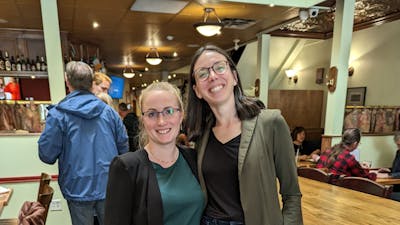 A photo of Laura and Emma in a pub