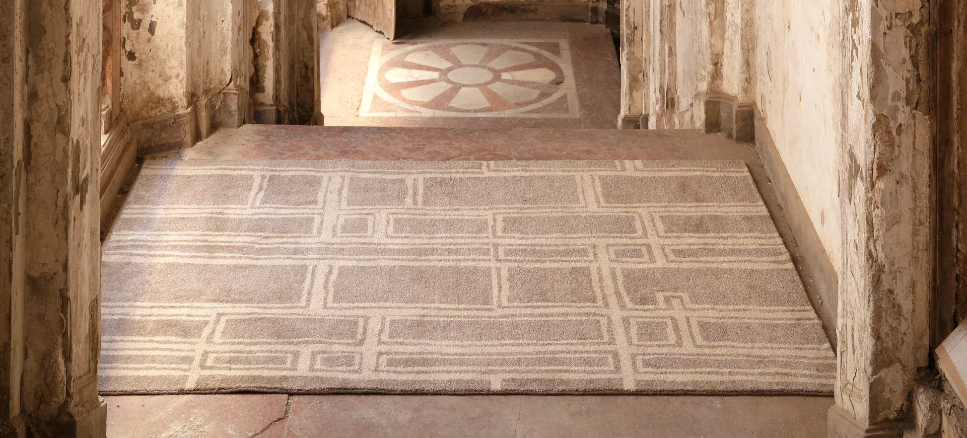Ancient stone hallway with Lavor Ombra rug