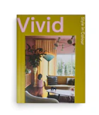 A book cover with an image of a warm colourful home