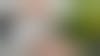 main d'une personne donnant posant une clé dans la main d'une autre personne