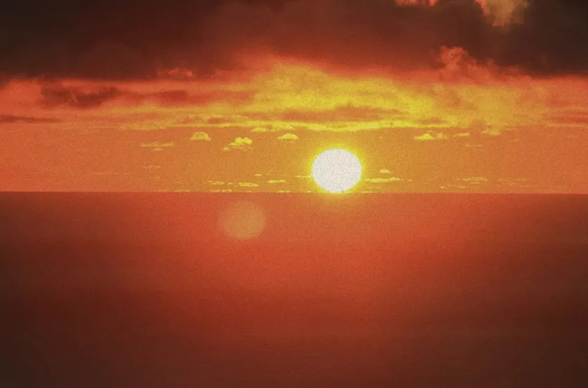 A deep orange summer sunset