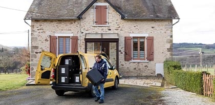man delivering parcel to someone's home