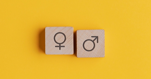 female and male symbol with yellow background