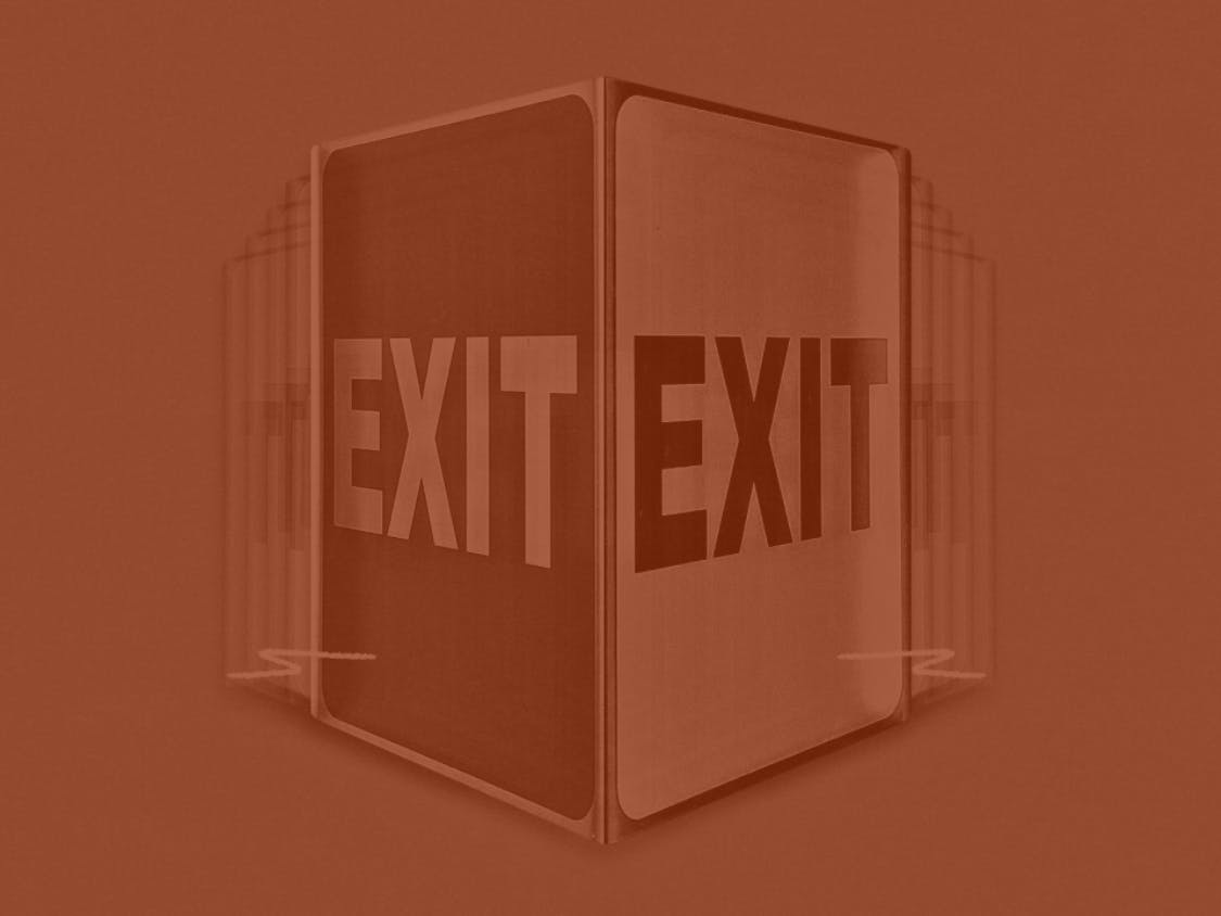 An exit sign is seen.