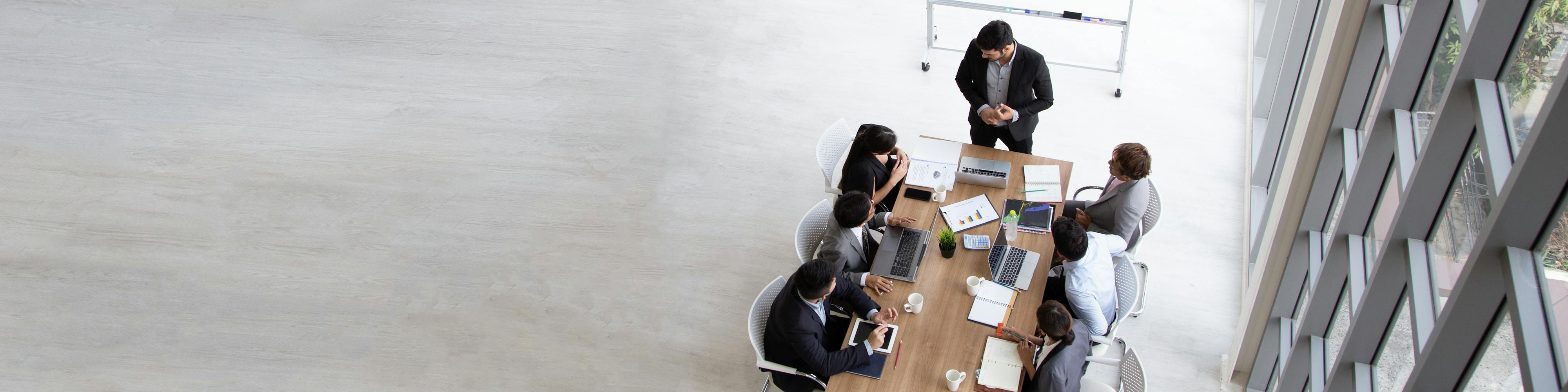 People participate in a meeting.