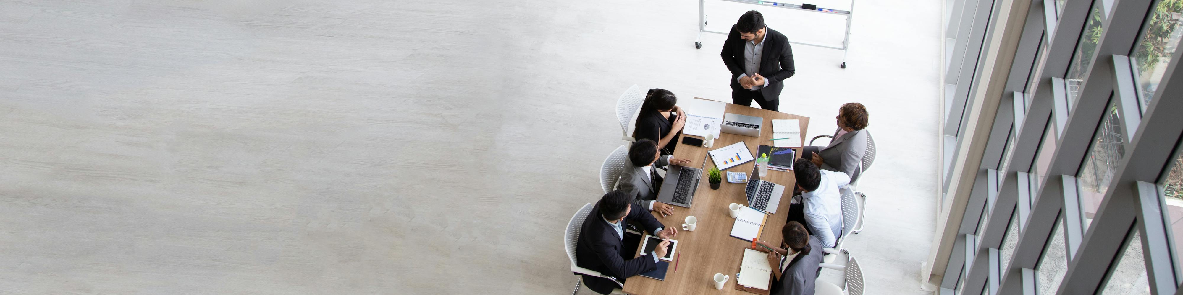 People participate in a meeting.