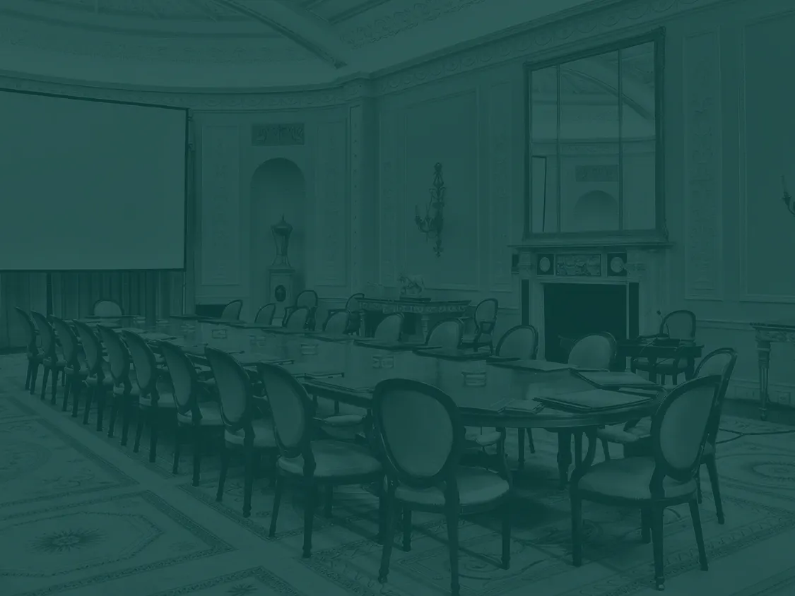 A long dining table is seen.