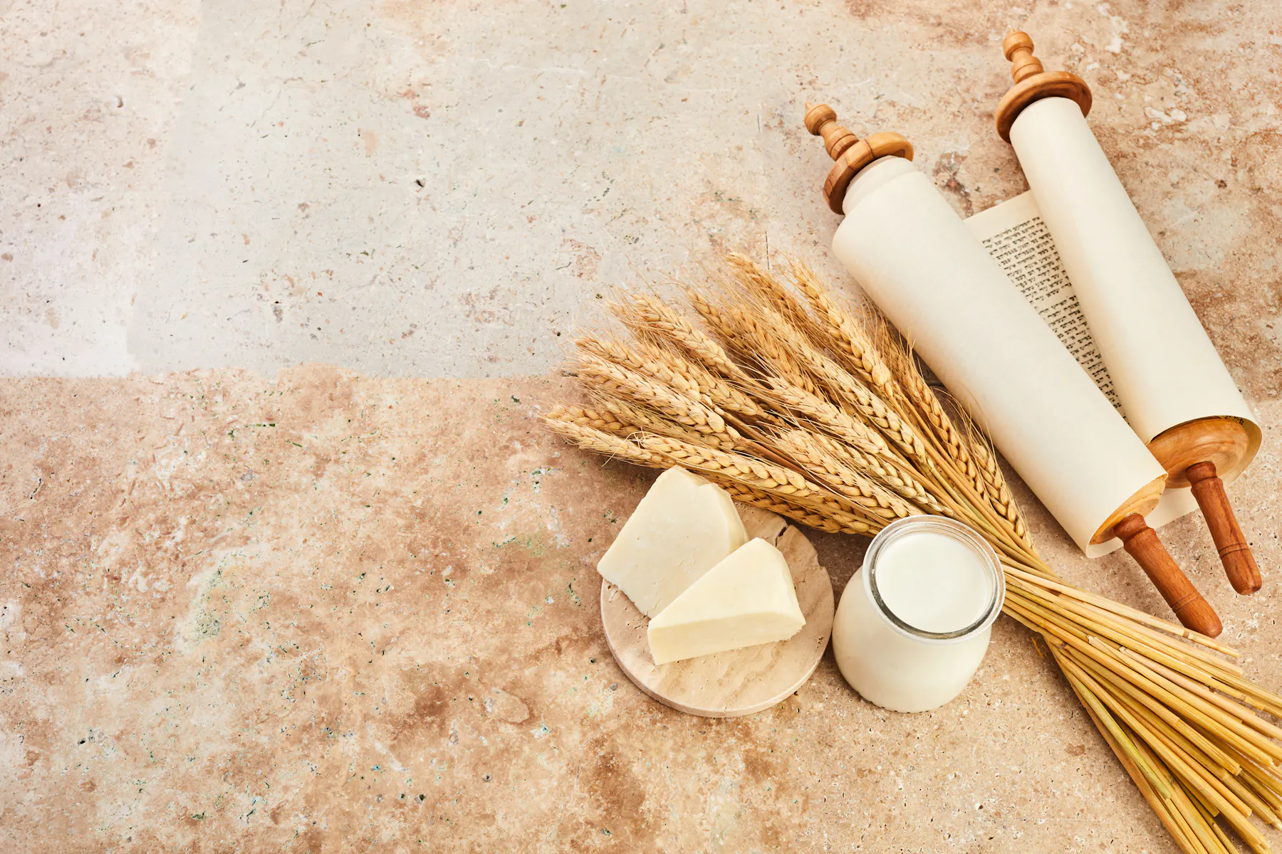 Torah, wheat, and dairy, symbolizing Shavuot