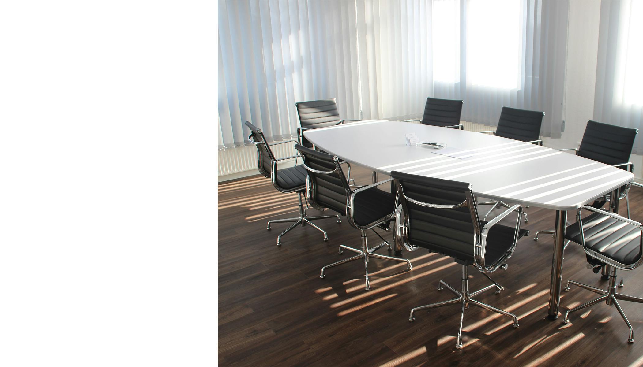 Photo of board room conference table and chairs