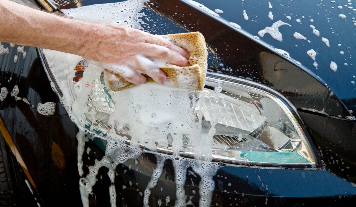 washing car headlights