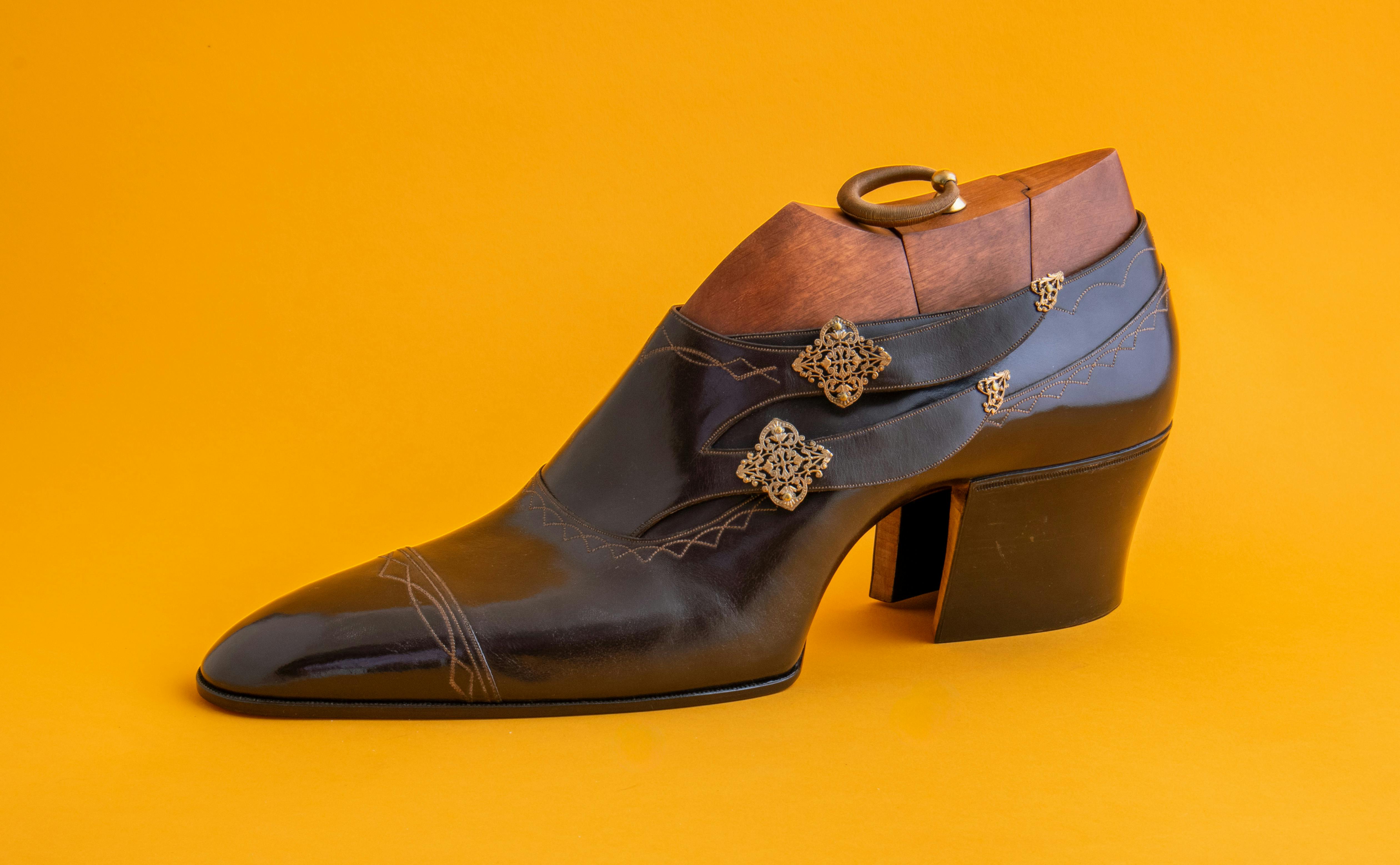 Side view of a brown double monk strap shoe by Ken Kataoka.
