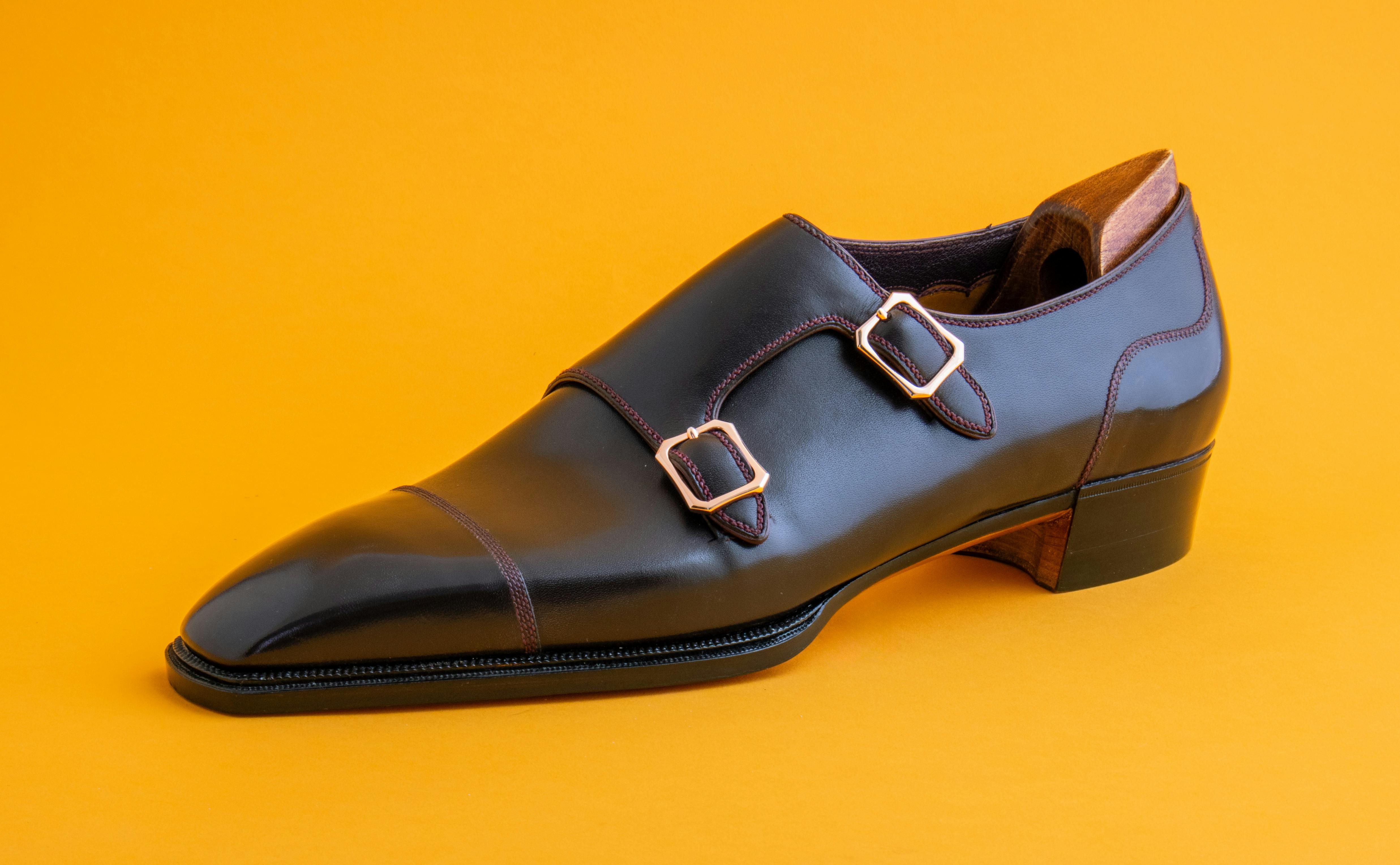 Side view of a brown double monk strap shoe made by Ken Hishinuma.
