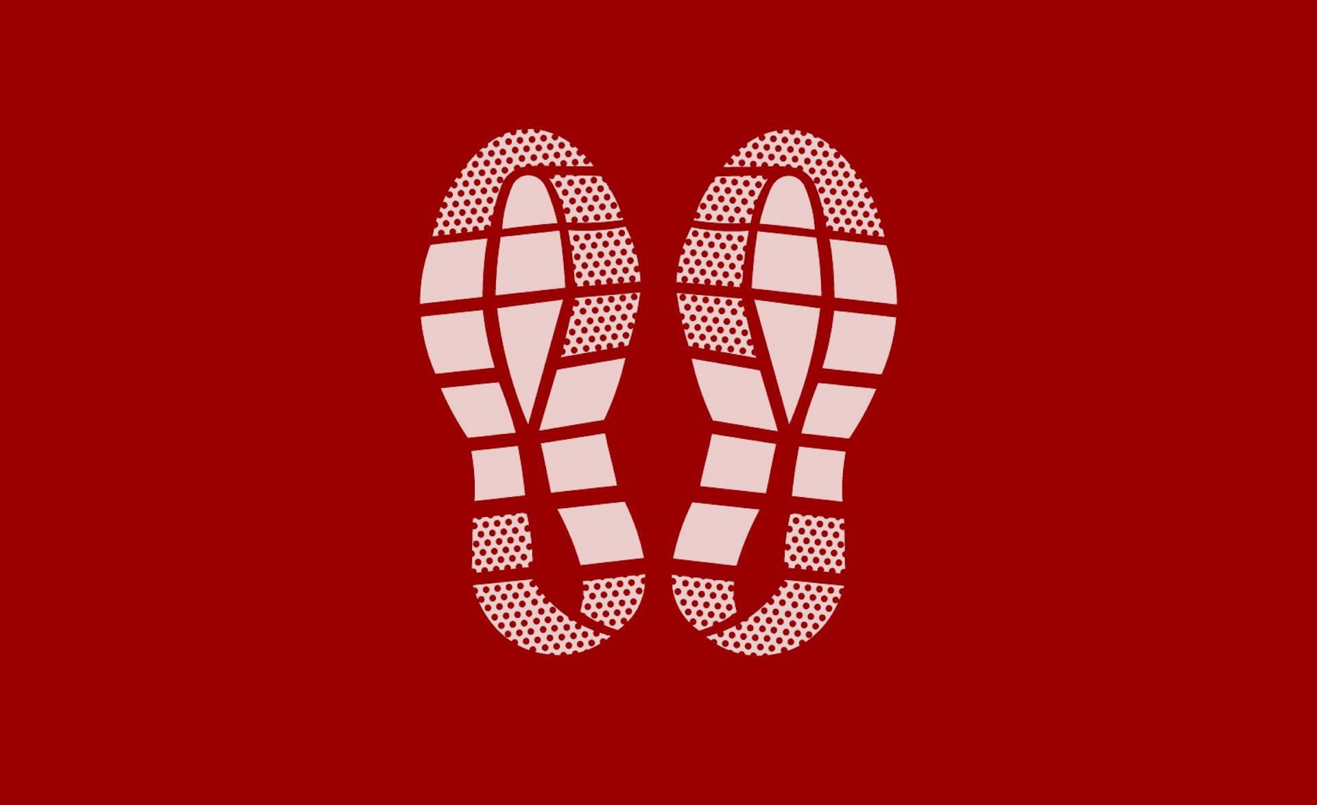 a pair of running shoes on a red background.