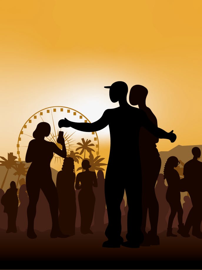 silhouettes of people at a festival.