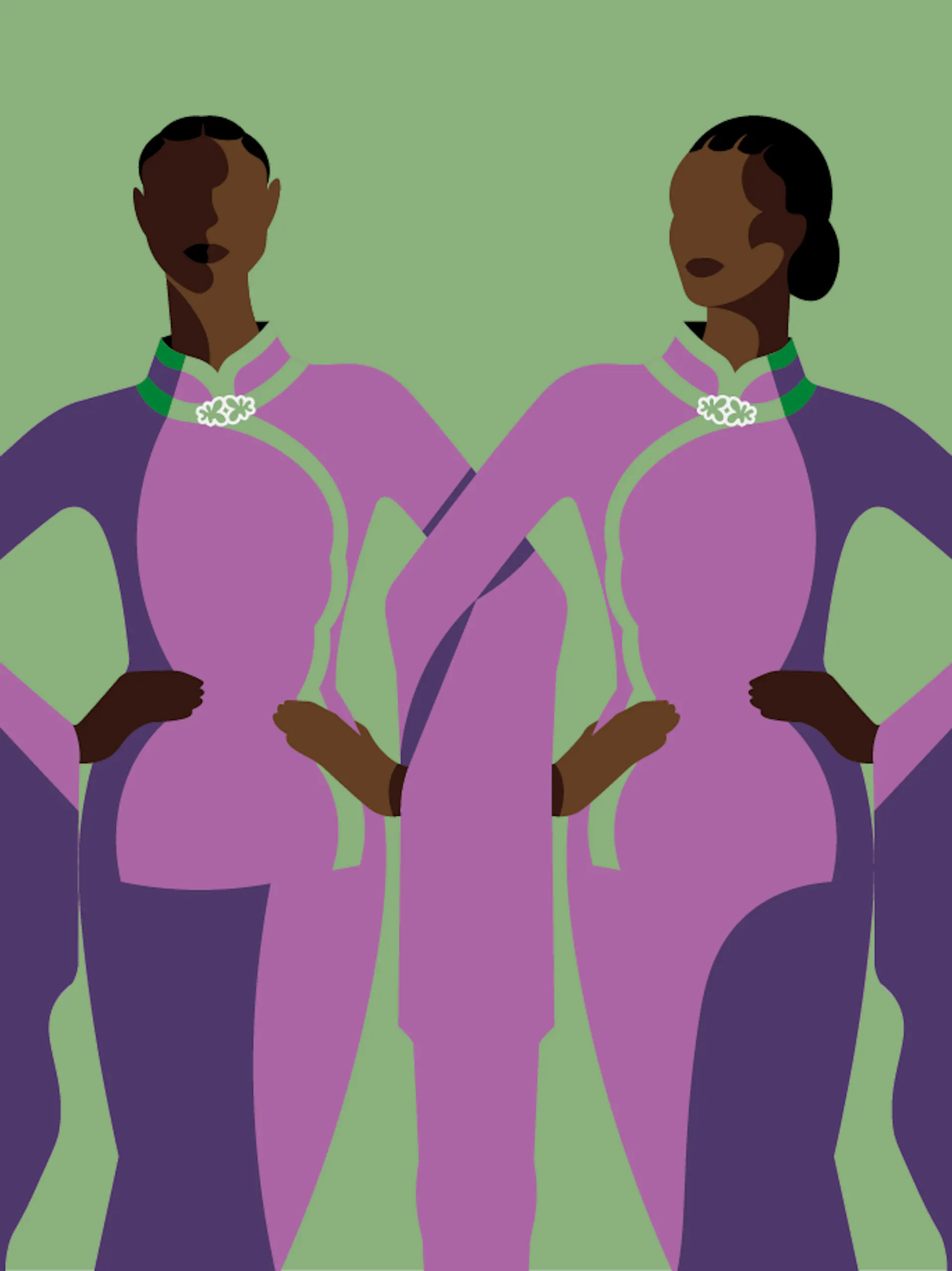 two women in purple dresses standing next to each other.
