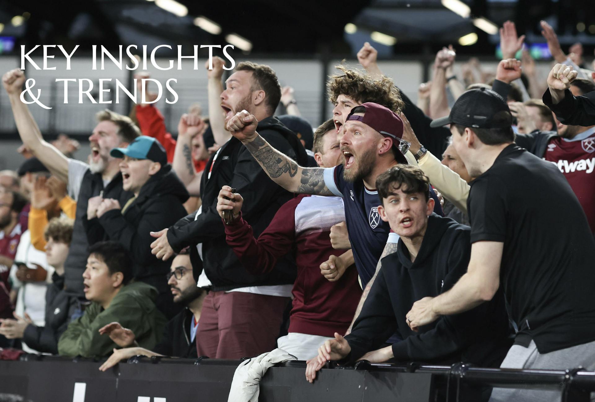 Fans cheering for a team.