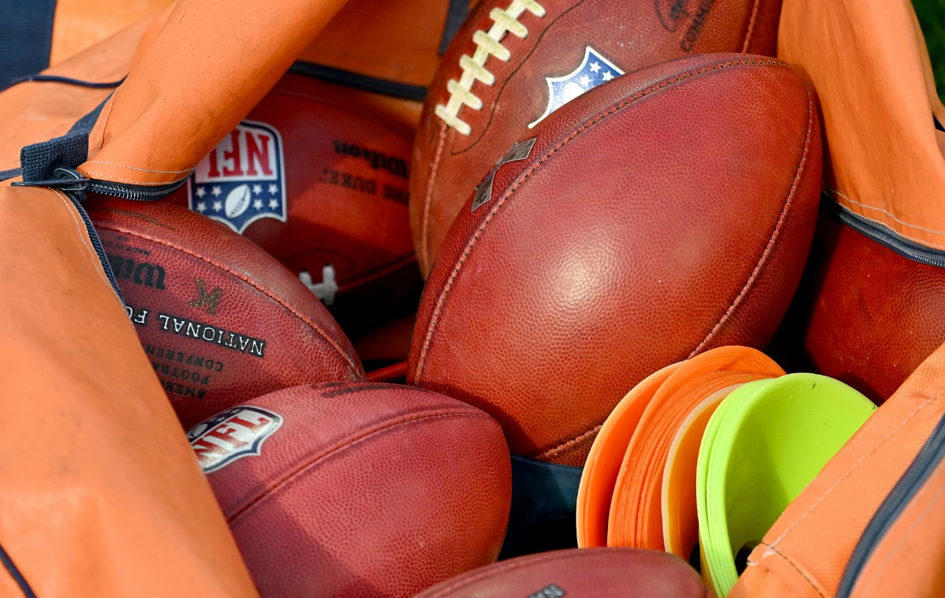 A pile of footballs