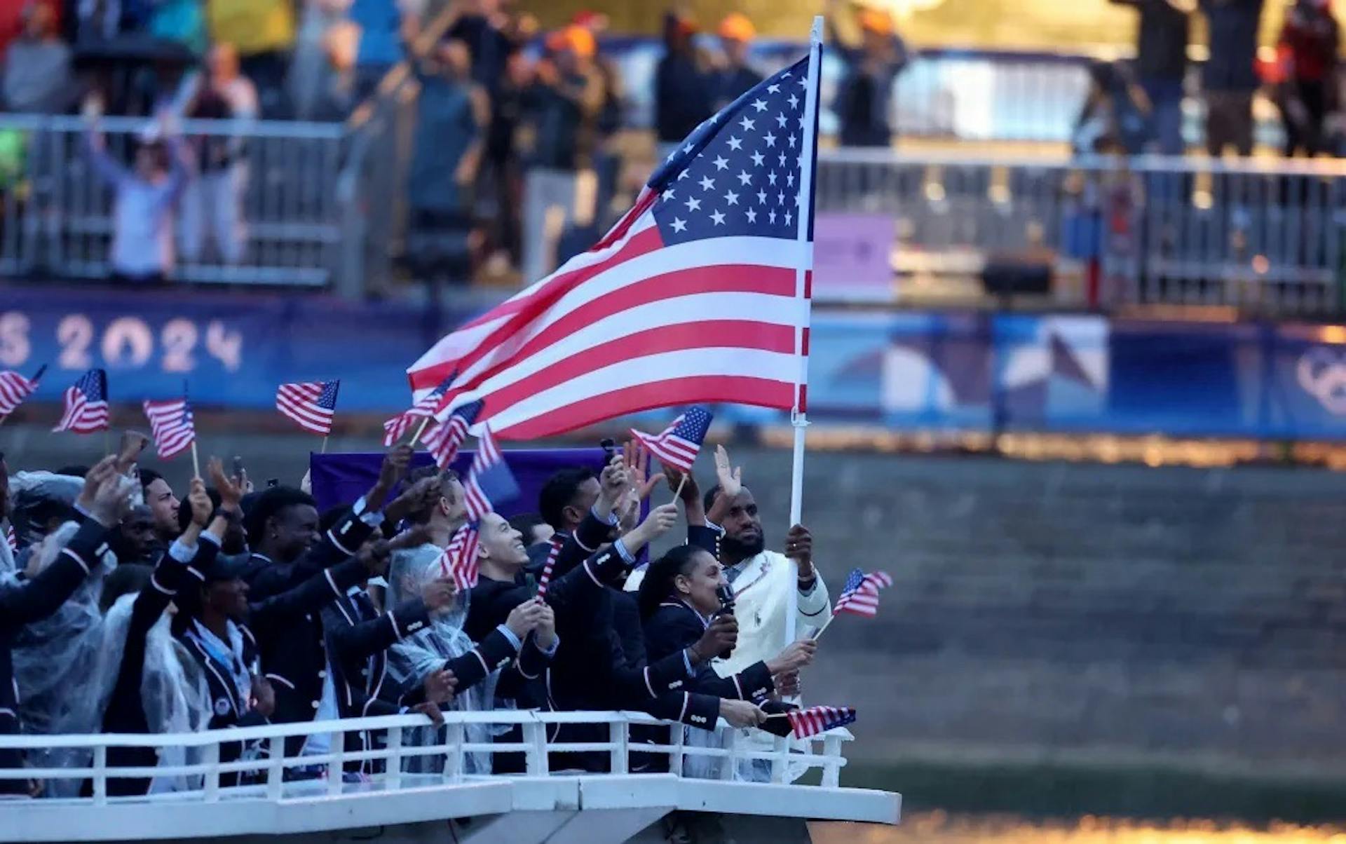 Lebron James carrying the American flag during the opening ceremony.