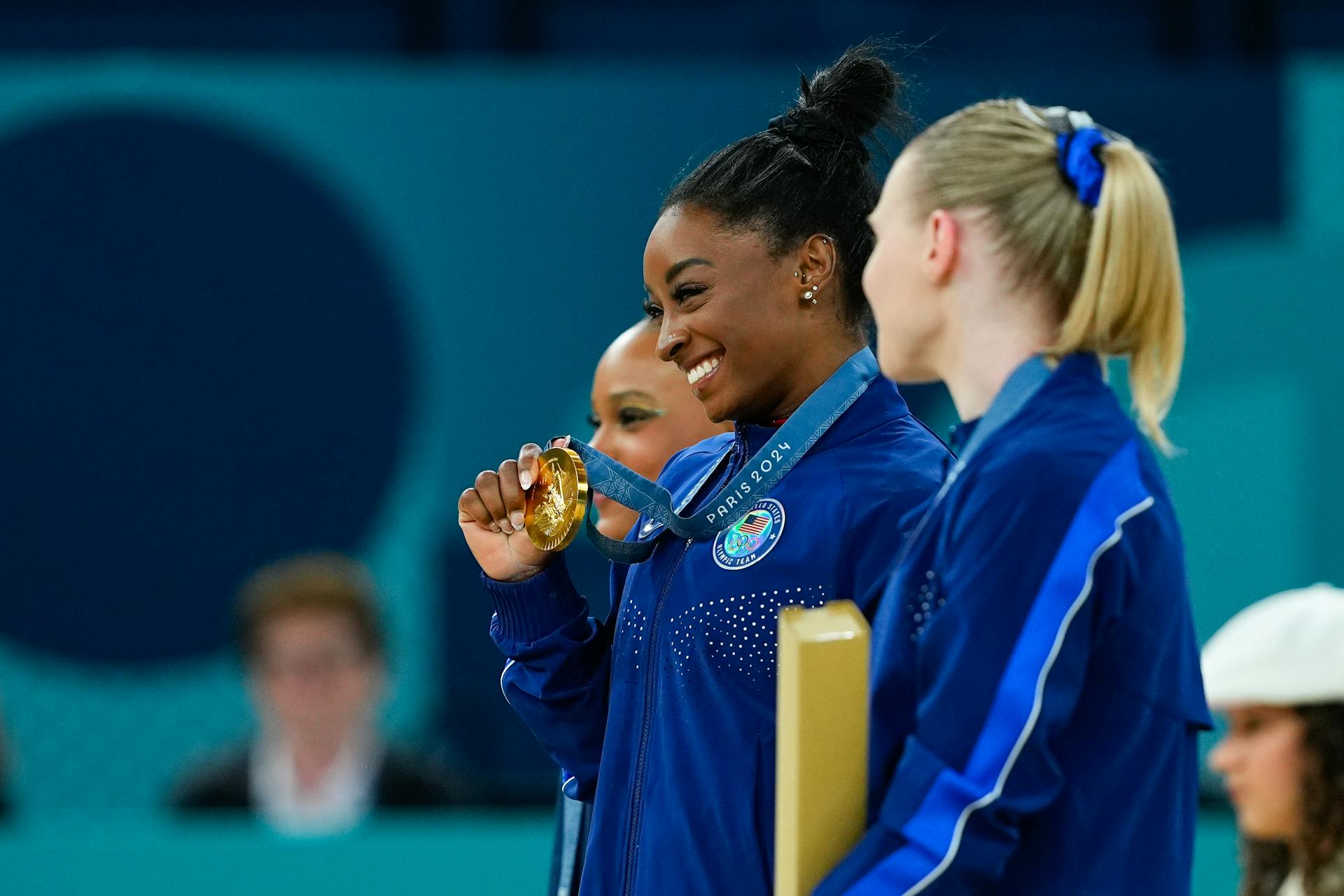 Simone Biles and Team USA's gold medal podium.