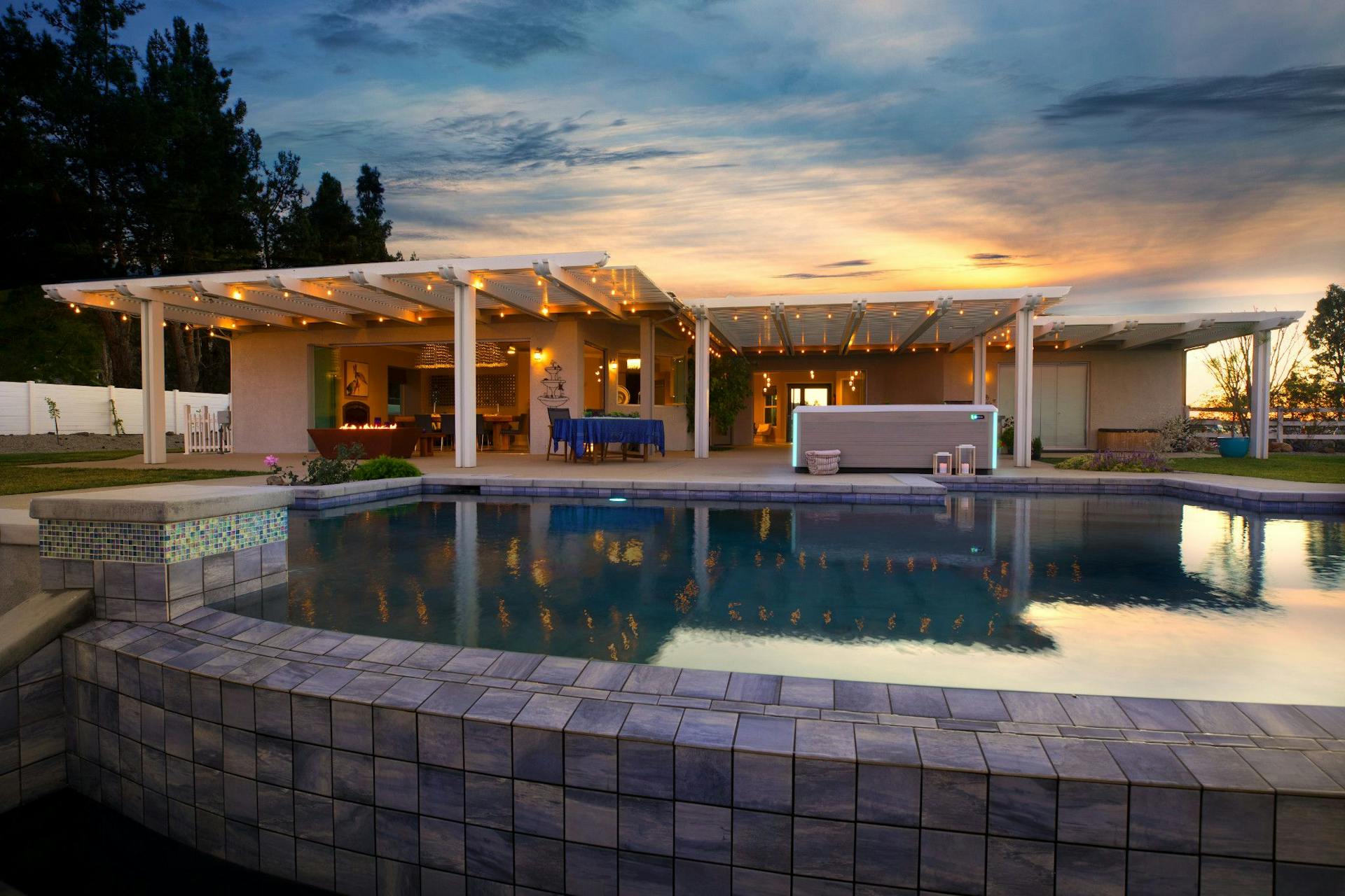 House with pool and hot tub out back