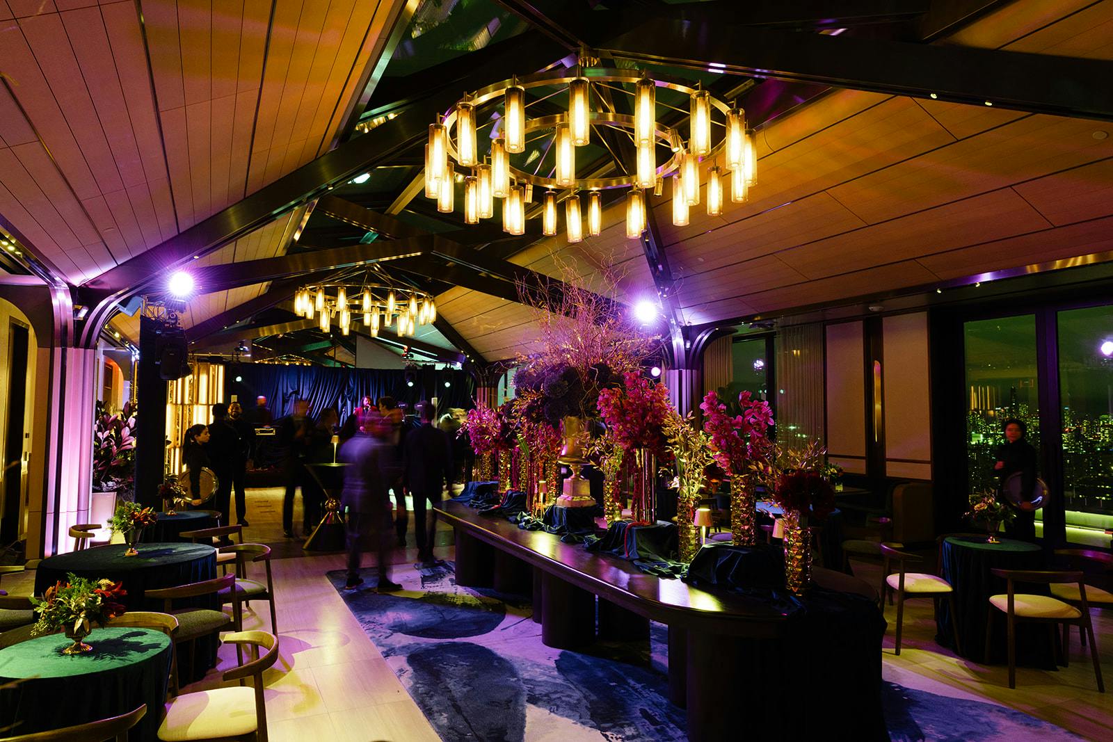 room interior with chandelier and table