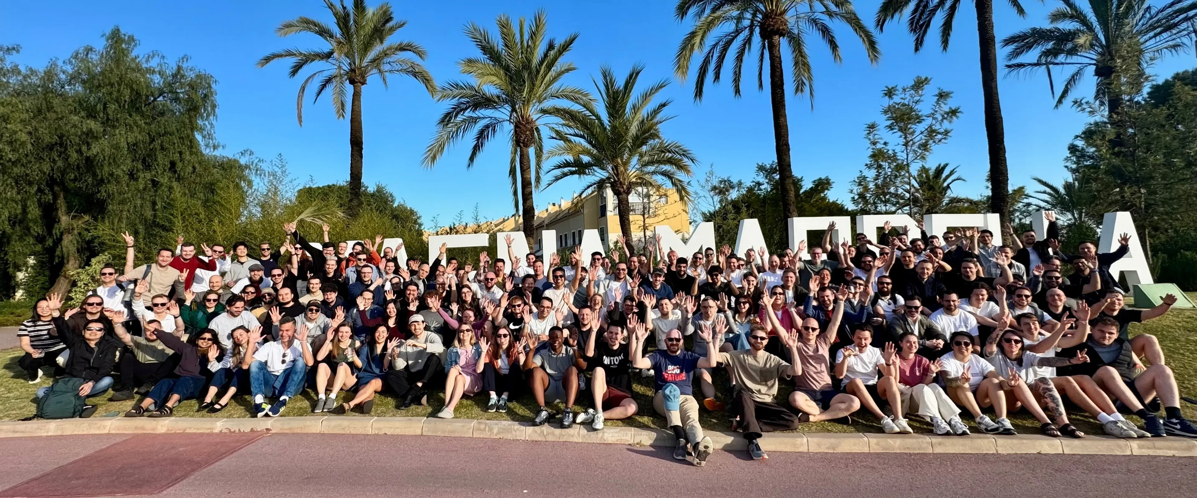 A group of people sat together at a team offsite.