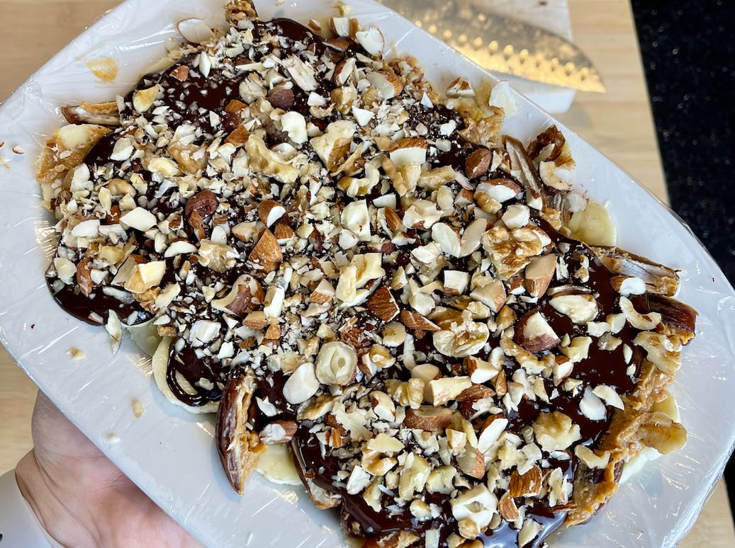 Banana data bark with peanut butter and mixed nuts