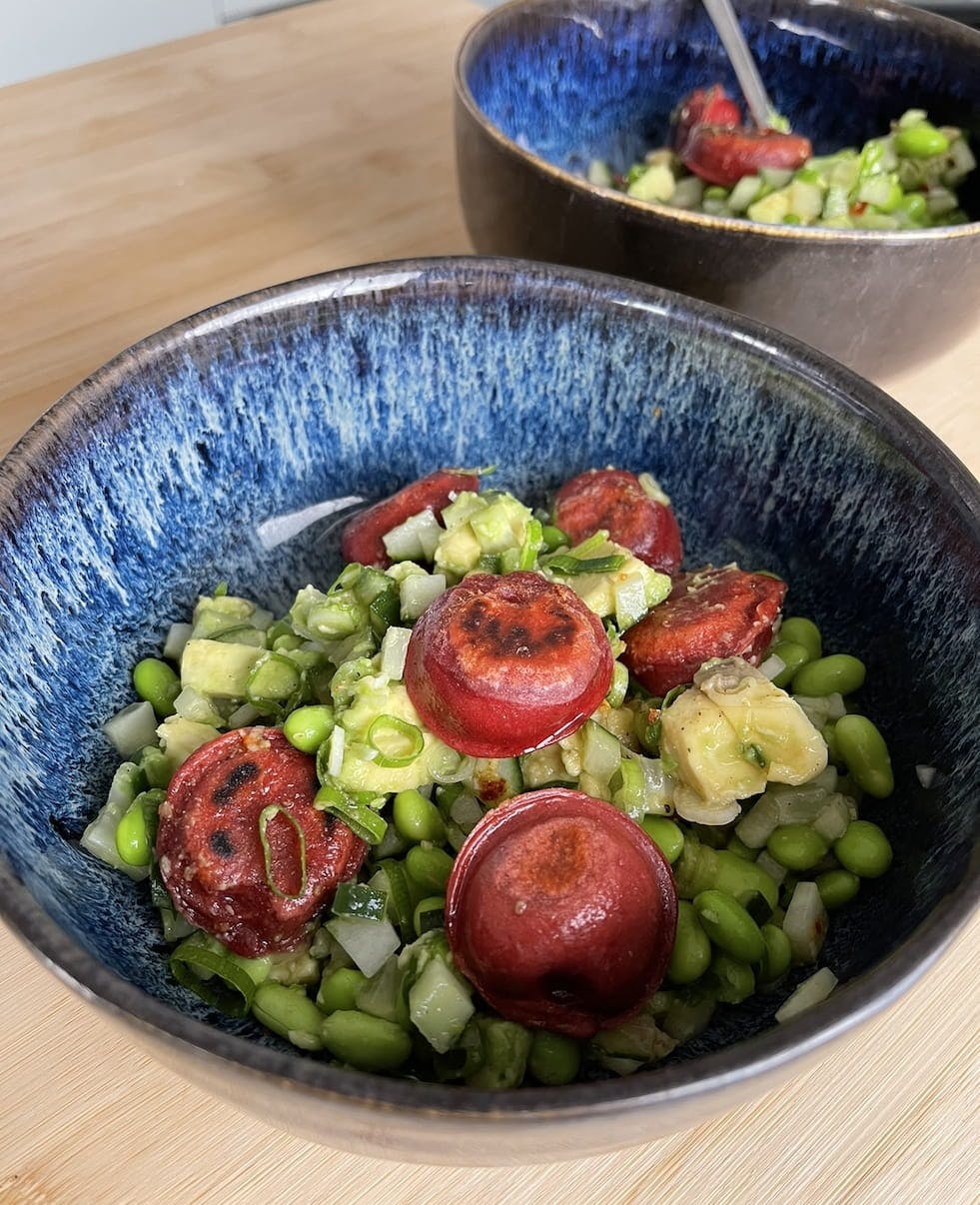 Green edamame salad with Davai Dumplings