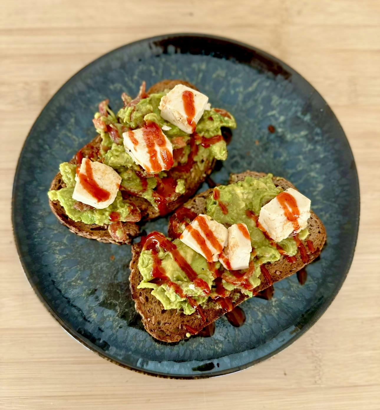 Sandwich with guacamole, silk tofu and sriracha