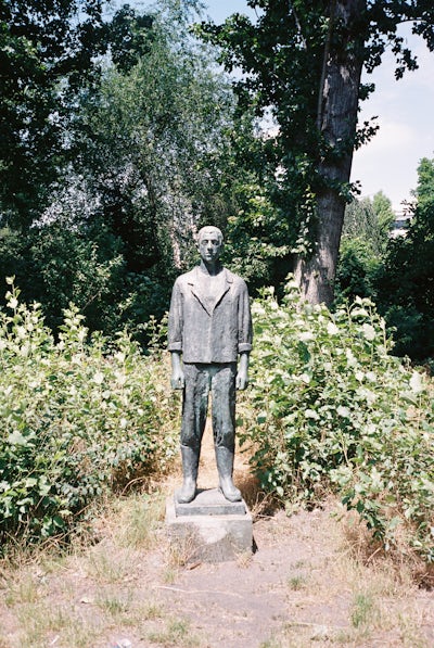 The statue "Junger Arbeiter" by Christa Sammler from 1963. Located in Berlin, Weißensee.