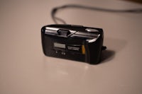 A photograph of the backside of the Olympus Mju II camera.
