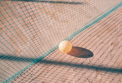 A balloon on a tennis court.