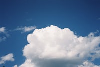 Clouds in a blue sky. On Kodak Portra 400.