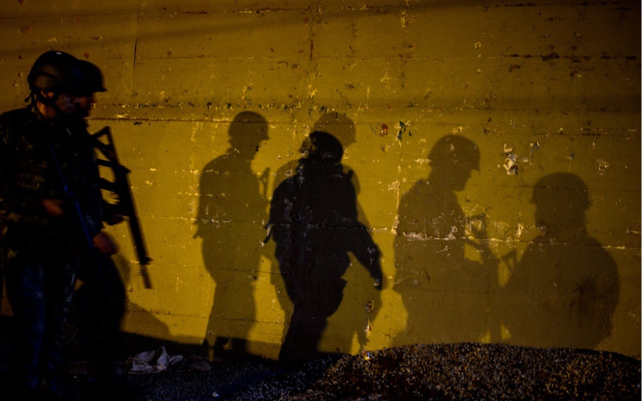Les forces de l'ordre dans les favelas de Rio © 	AFP/Getty Images