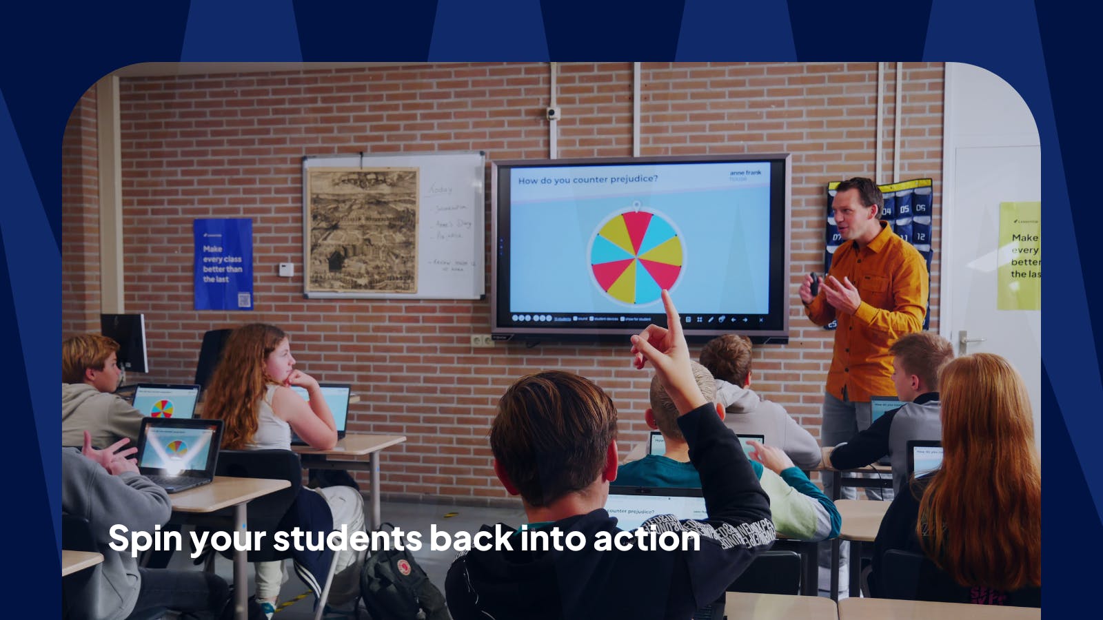 Students in class with hands raised, the teacher is using a digital spinner on the smart board for equality