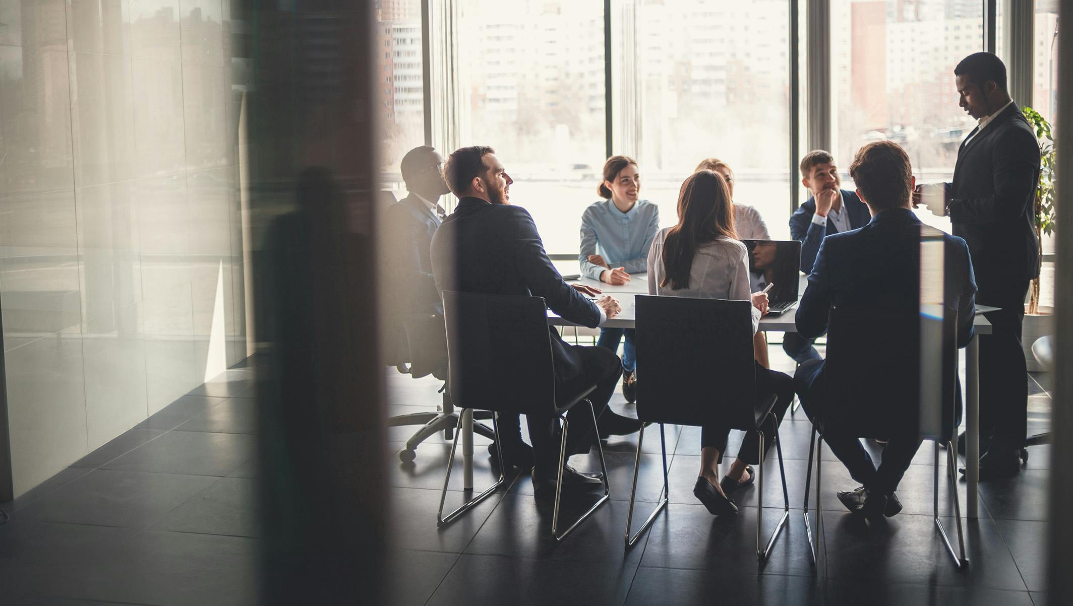 A picture of a meeting in a conference room