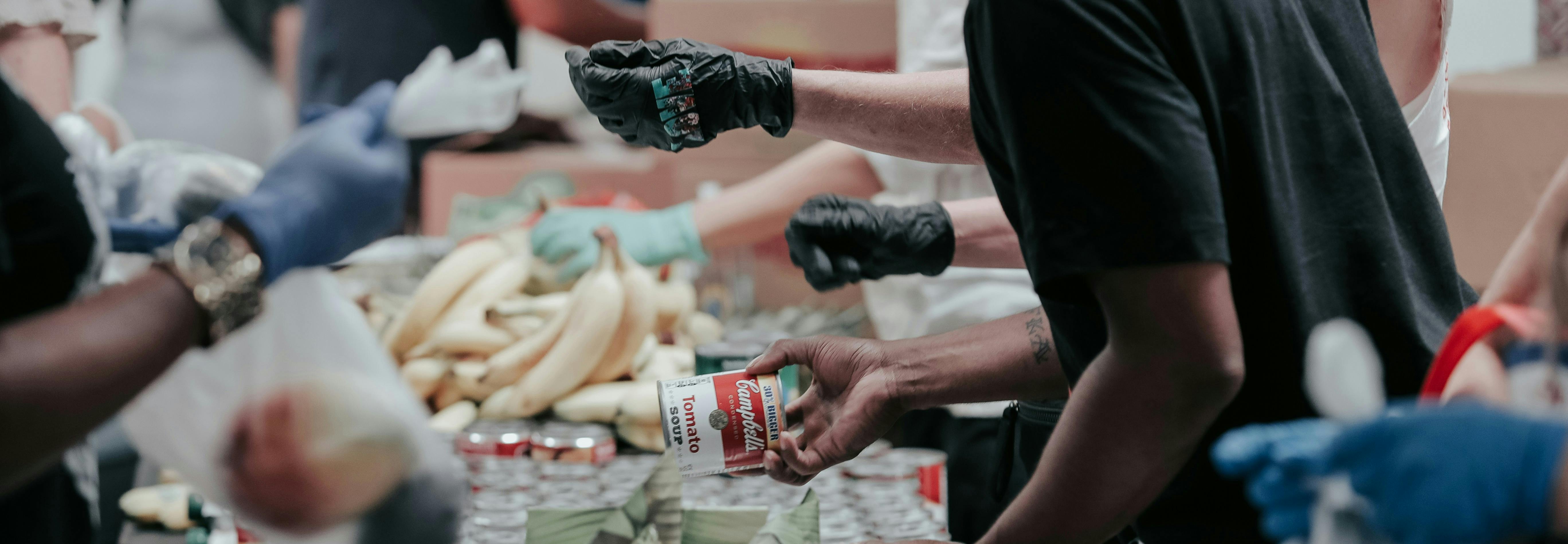 Volunteers packing food