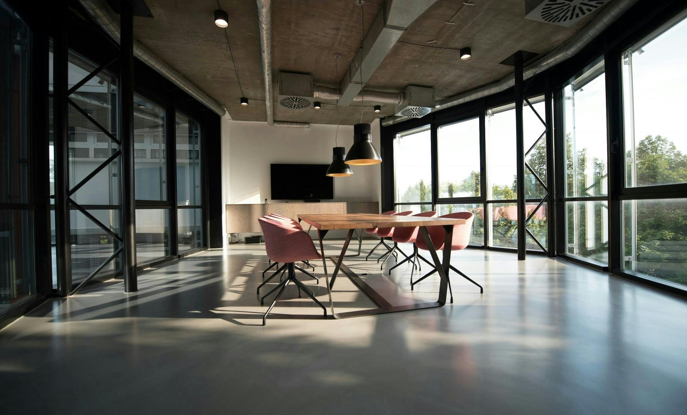 Photo of conference room with large windows to the outdoors