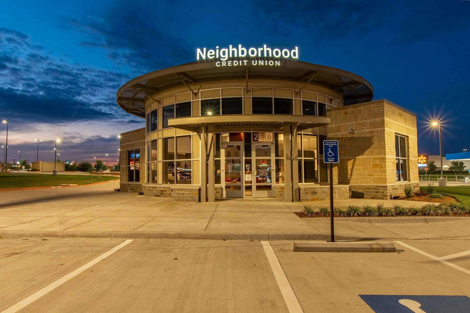 Photo of the Neighborhood Credit Union building from the parking lot