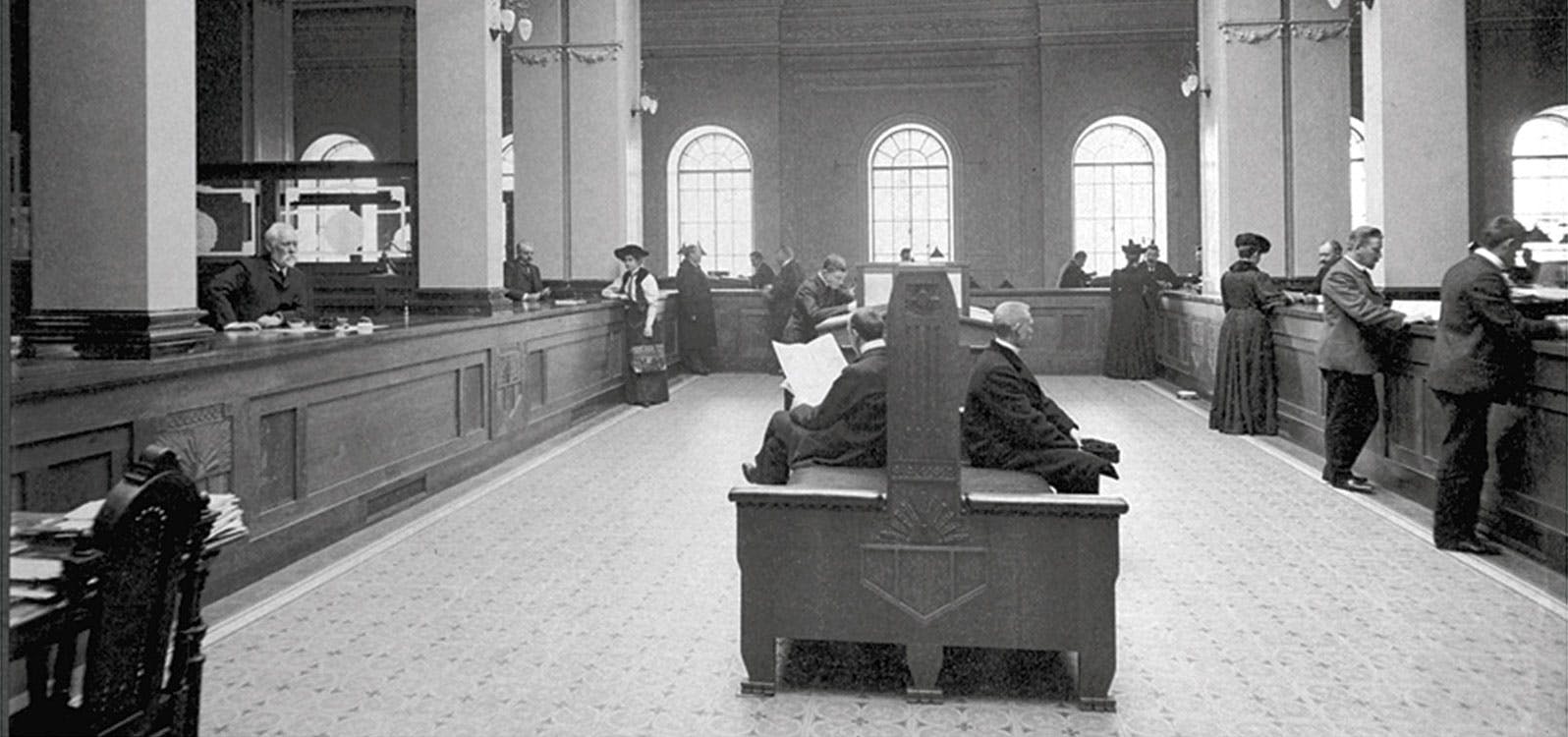 Black & white photo of the inside of an old bank