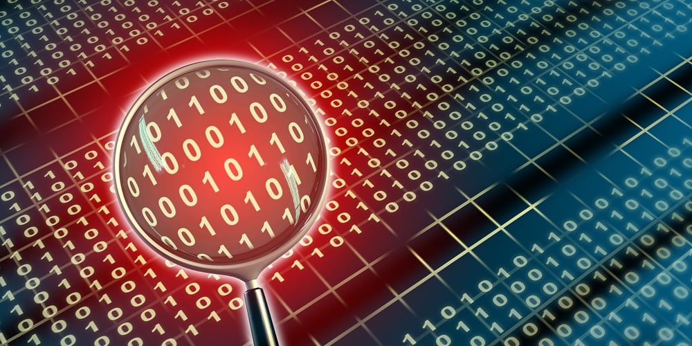 magnifying glass looking for trends to help credit unions grow core deposits