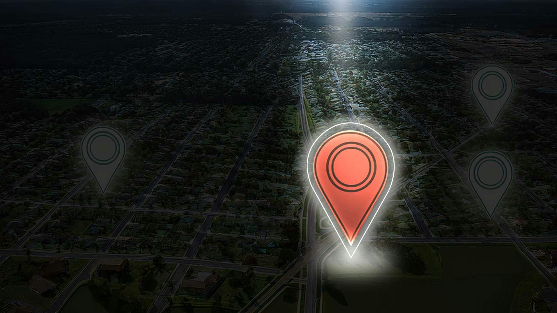 A map pin shining in a spotlight