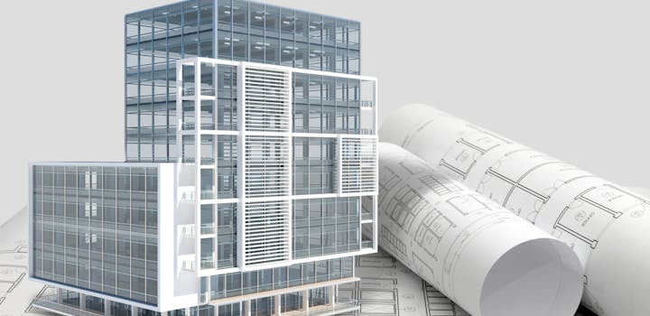 Building next to rolled up blueprints