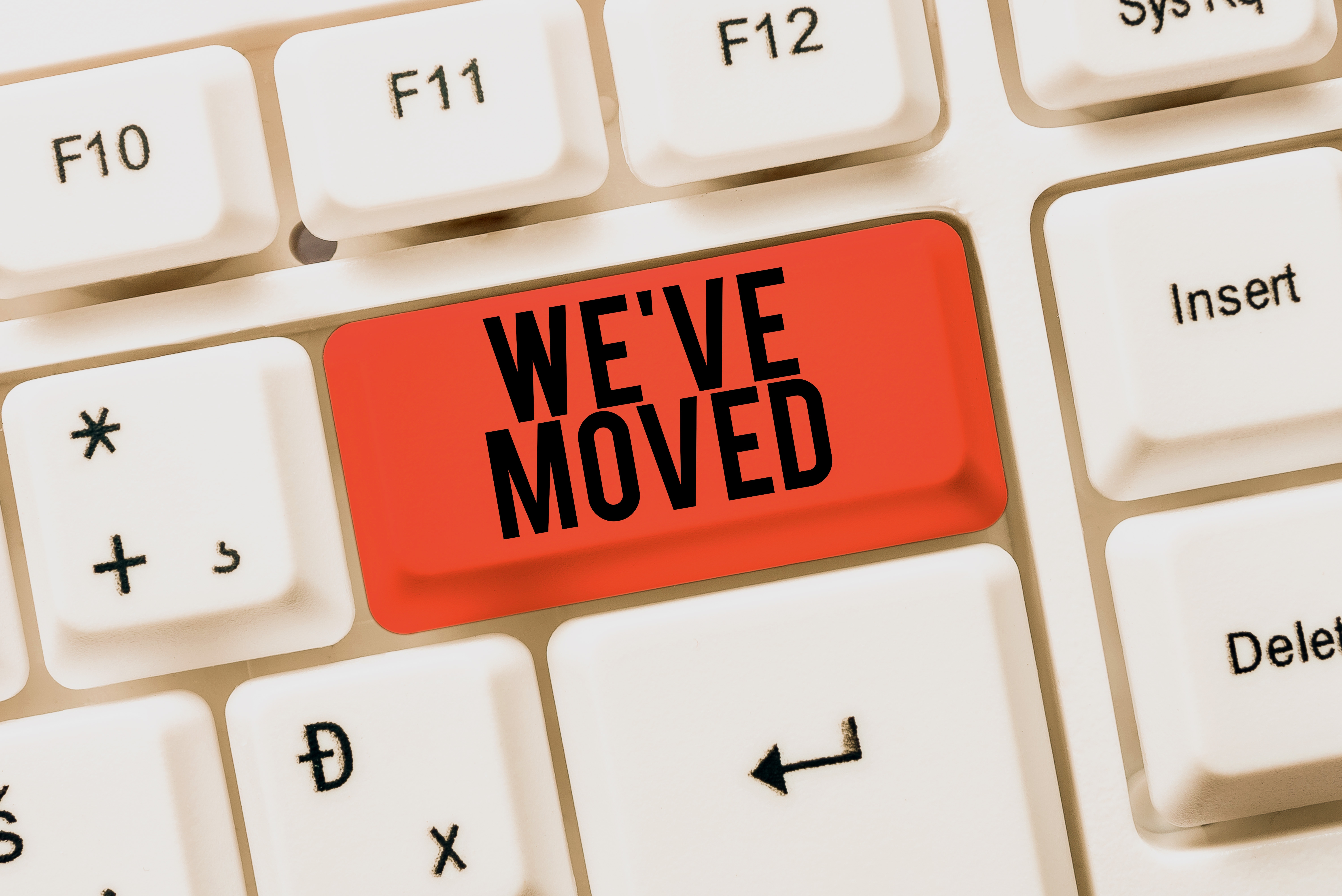 key on keyboard that says "we've moved"