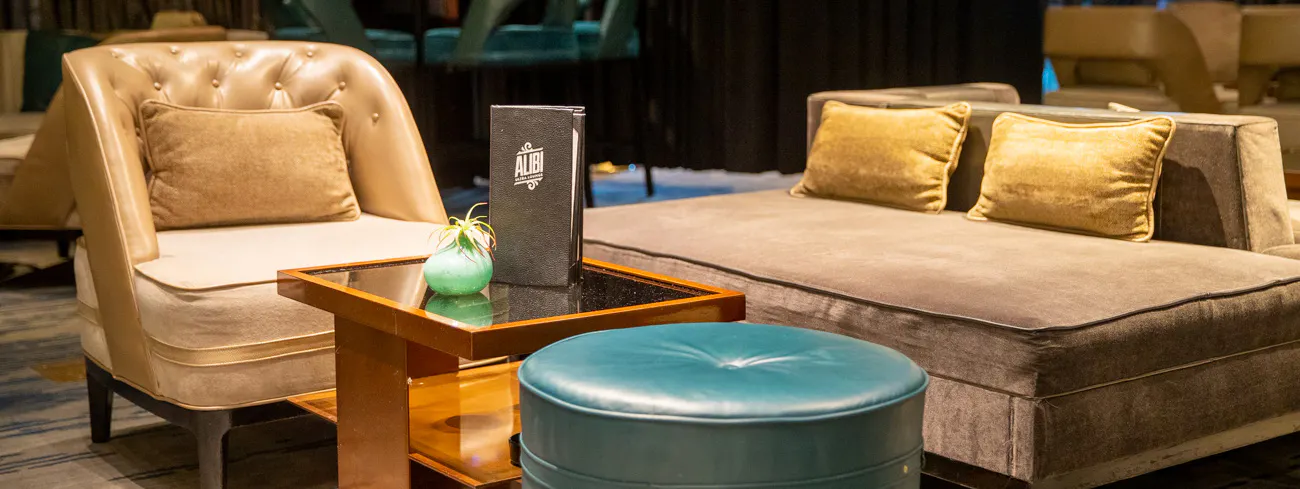 seating around a table in Alibi bar