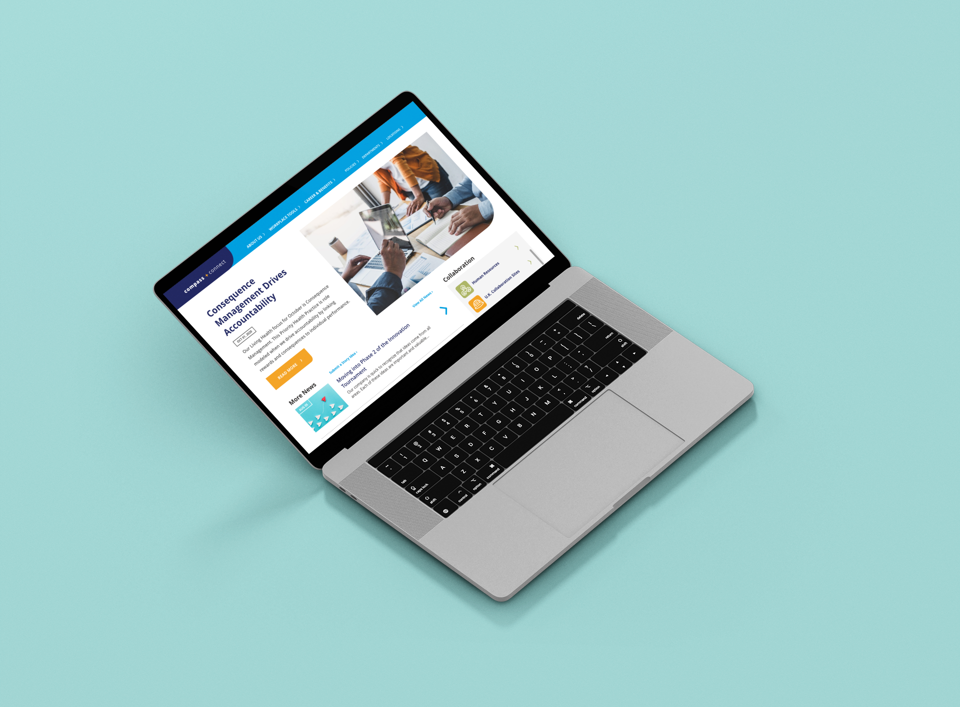 Laptop with Compass Minerals intranet on screen