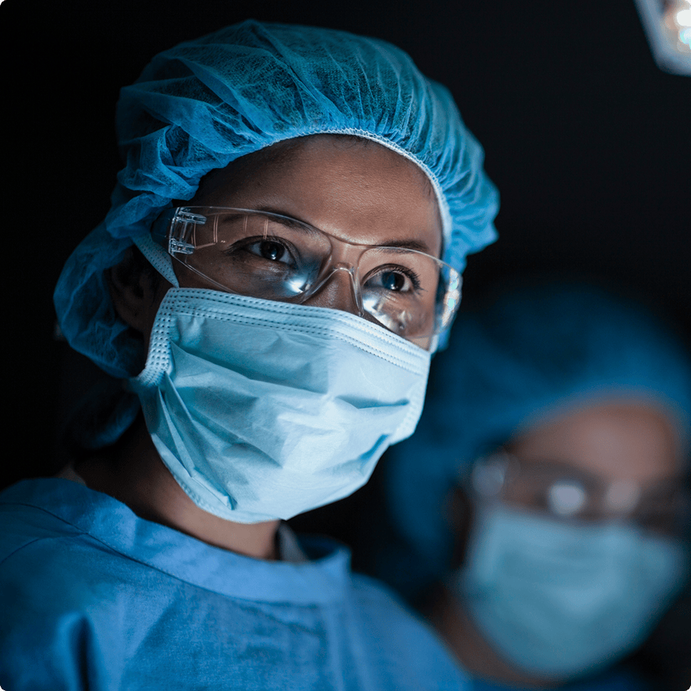 Scrubbed personnel in the dark