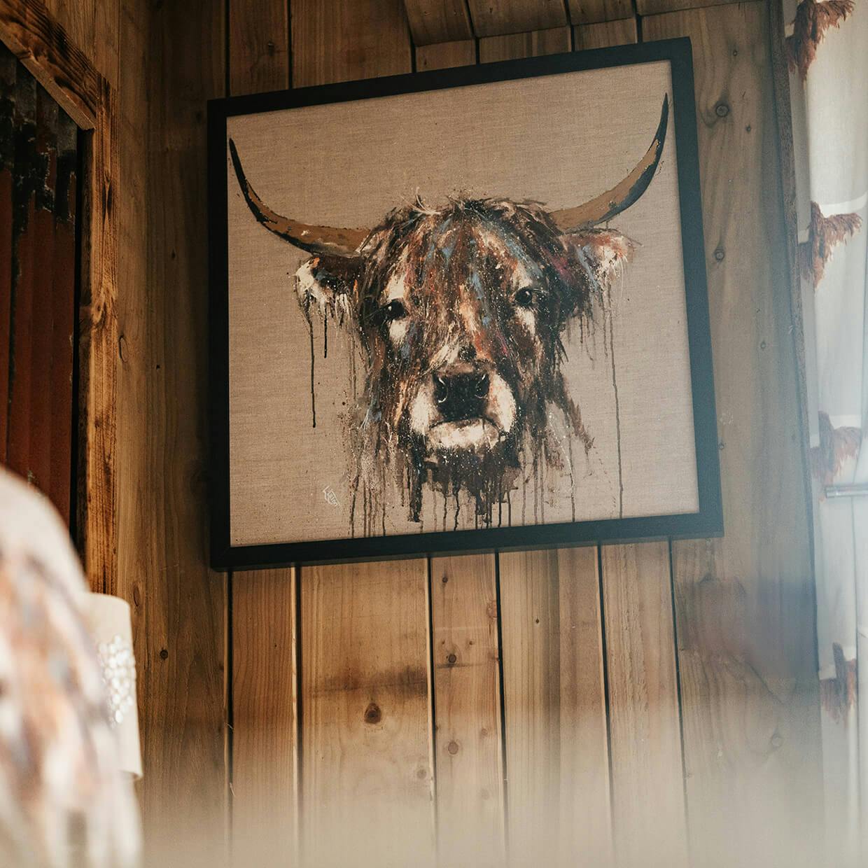highland cow painting hotel brand
